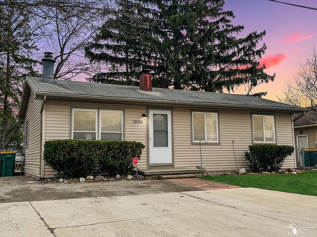 35381 Dern Dr, Rockwood, MI 48173 - view of front of property with a chimney
