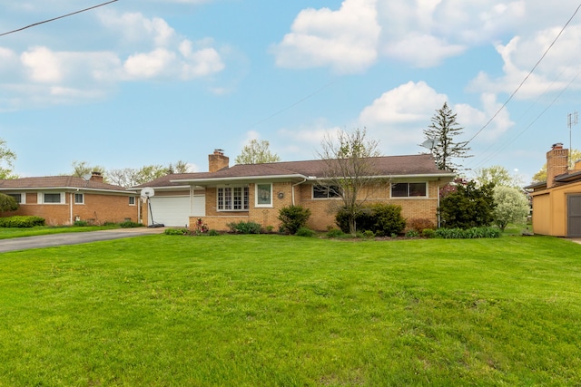 3928 Embarcadero St, Waterford, MI 48329 - ranch-style house featuring driveway, brick siding, a garage, a front lawn, and a chimney