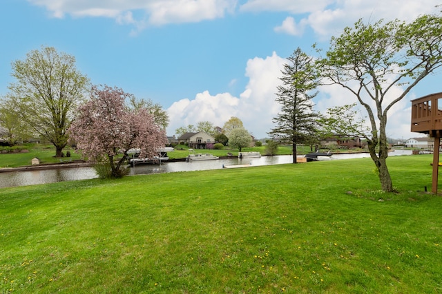 3928 Embarcadero St, Waterford, MI 48329 - view of green lawn with a water view