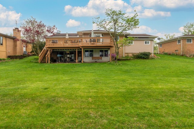 3928 Embarcadero St, Waterford, MI 48329 - back of house featuring a deck, a yard, and stairway