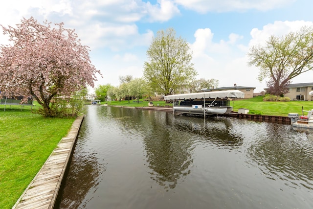 3928 Embarcadero St, Waterford, MI 48329 - dock area featuring a water view and a lawn
