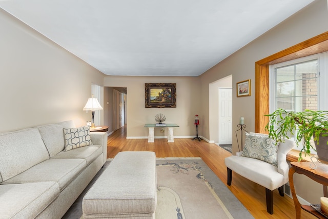 3928 Embarcadero St, Waterford, MI 48329 - living room featuring wood finished floors and baseboards