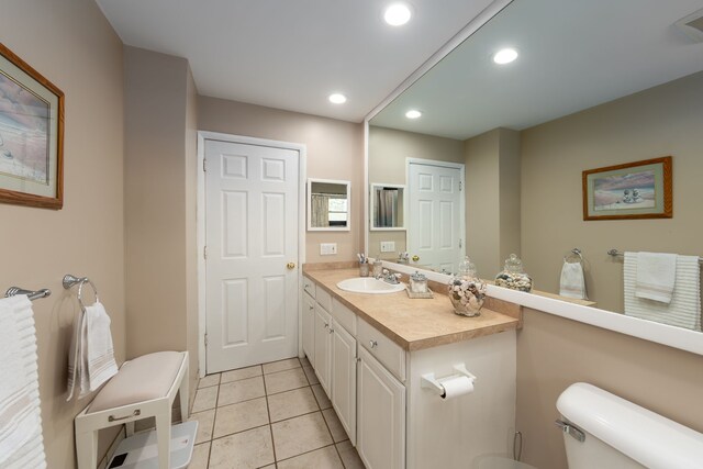 3928 Embarcadero St, Waterford, MI 48329 - bathroom featuring toilet, tile patterned flooring, recessed lighting, and vanity