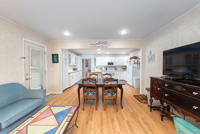 3928 Embarcadero St, Waterford, MI 48329 - dining space with ornamental molding, light wood-type flooring, and recessed lighting