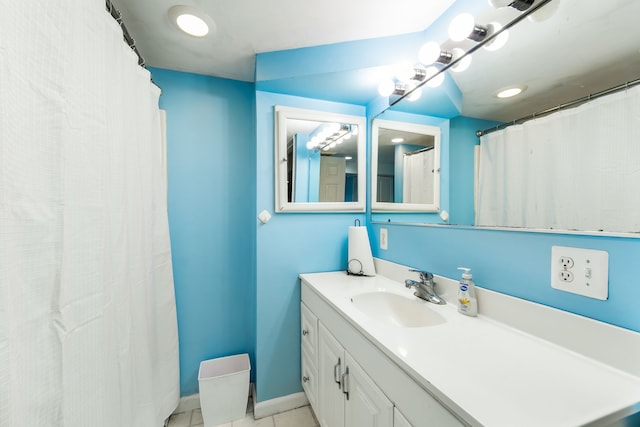 3928 Embarcadero St, Waterford, MI 48329 - full bathroom with tile patterned flooring, vanity, and baseboards