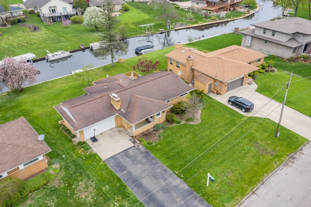 3928 Embarcadero St, Waterford, MI 48329 - aerial view of residential area featuring a nearby body of water