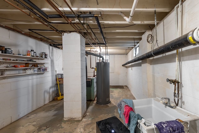 unfinished basement featuring water heater and concrete block wall