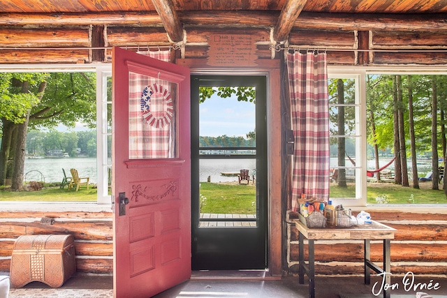 exterior space with a water view