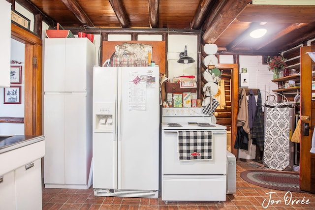 kitchen featuring brick floor, white appliances, and wood ceiling