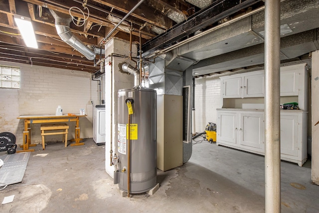 below grade area featuring heating unit and water heater