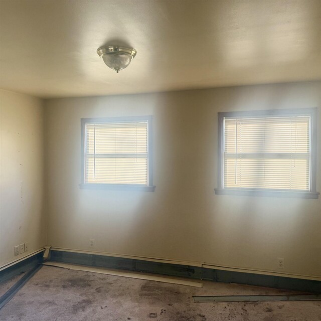 2905 W Burt Rd, Montrose, MI 48457 - carpeted empty room with baseboards