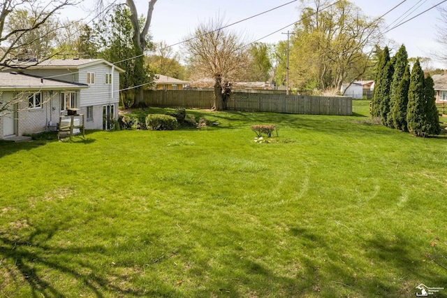 view of yard with fence