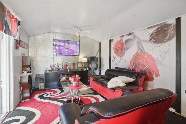 living room featuring vaulted ceiling and ceiling fan