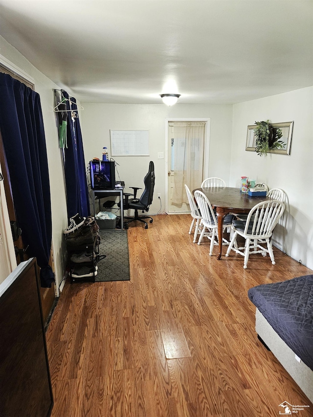 dining room with wood finished floors