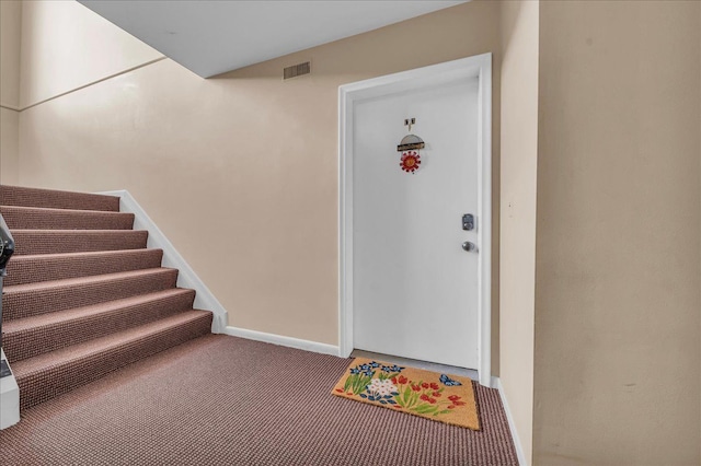 view of exterior entry featuring visible vents