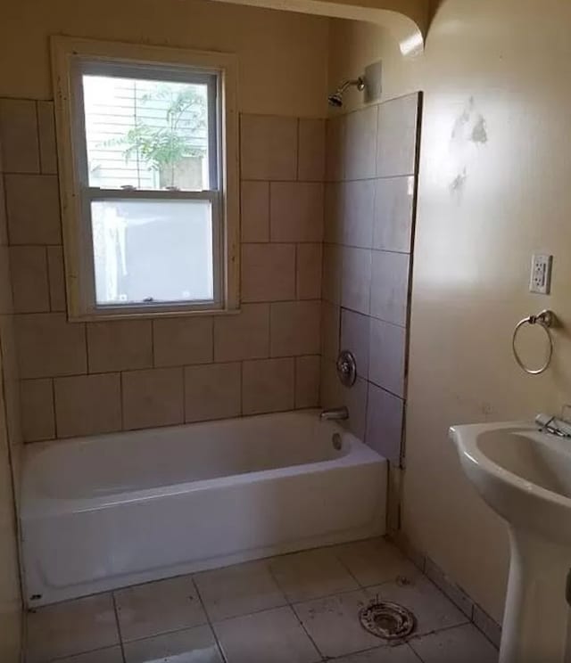 bathroom featuring tile patterned floors and bathtub / shower combination