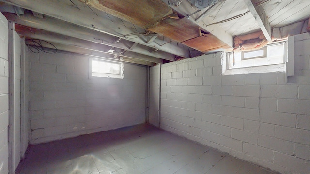 basement with tile patterned floors