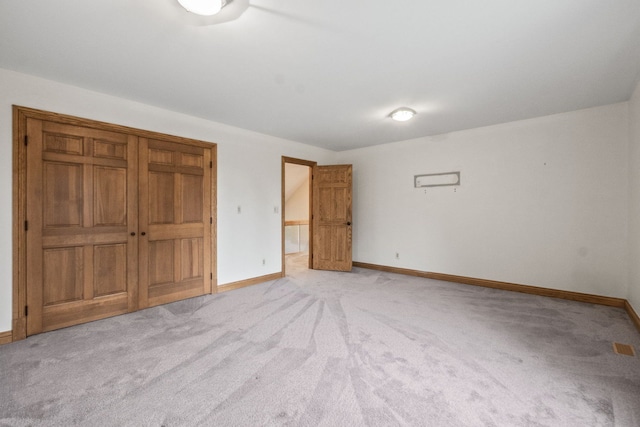 3101 Delano Rd, Oxford, MI 48371 - unfurnished bedroom featuring light carpet and baseboards