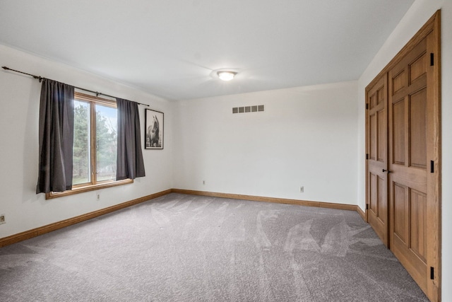 3101 Delano Rd, Oxford, MI 48371 - carpeted empty room featuring baseboards