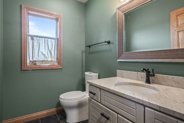 3101 Delano Rd, Oxford, MI 48371 - bathroom featuring baseboards, toilet, and vanity