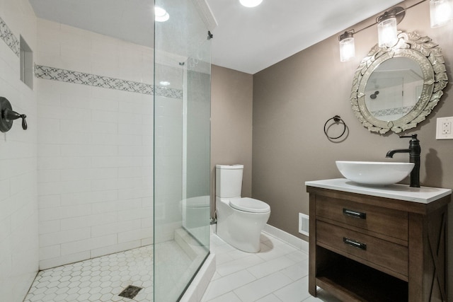 3101 Delano Rd, Oxford, MI 48371 - bathroom featuring tiled shower, toilet, tile patterned floors, vanity, and baseboards