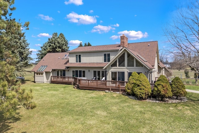 3101 Delano Rd, Oxford, MI 48371 - rear view of property with a chimney, a yard, a wooden deck, and a shingled roof