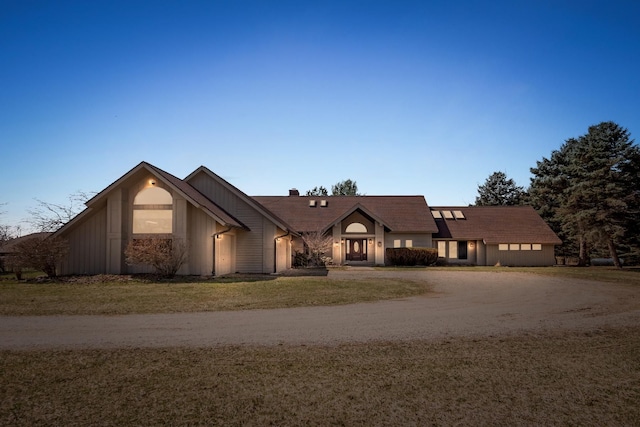 3101 Delano Rd, Oxford, MI 48371 - view of front facade with board and batten siding and dirt driveway