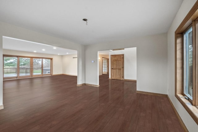 3101 Delano Rd, Oxford, MI 48371 - spare room featuring dark wood-style flooring, baseboards, and recessed lighting
