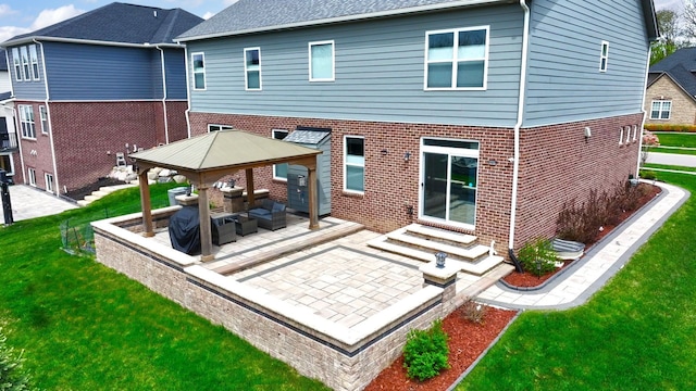 43547 Bolingbrooke Ln, Novi, MI 48377 - rear view of property with a gazebo, brick siding, a yard, a patio, and entry steps