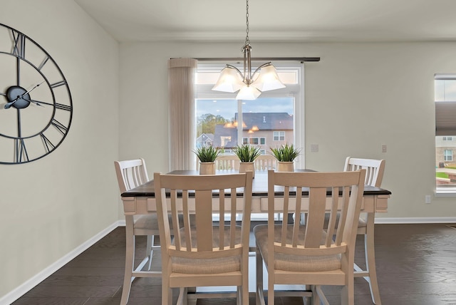 43547 Bolingbrooke Ln, Novi, MI 48377 - dining space featuring baseboards, dark wood-style flooring, and a chandelier