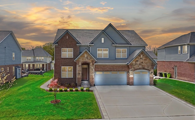 43547 Bolingbrooke Ln, Novi, MI 48377 - view of front facade with concrete driveway, a lawn, a garage, brick siding, and a shingled roof