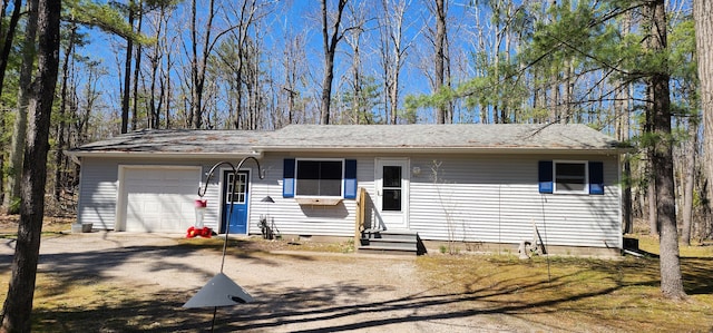 5608 Clifford St, Topinabee, MI 49791 - single story home featuring a garage, entry steps, driveway, and crawl space