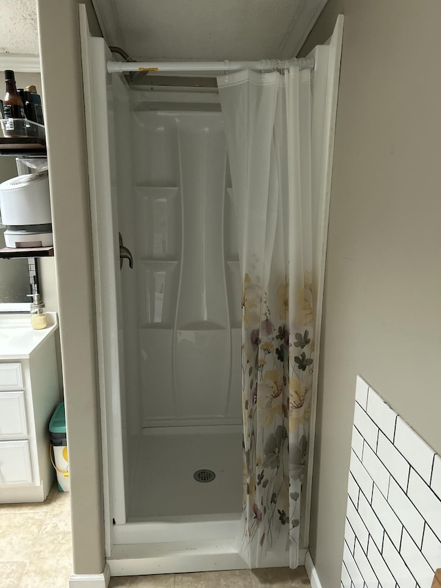 11005 Elm Ave, Howard City, MI 49329 - full bathroom with a shower stall and tile patterned floors