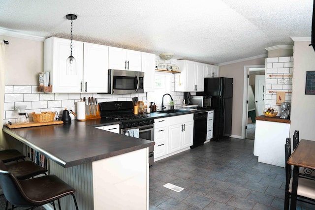 11005 Elm Ave, Howard City, MI 49329 - kitchen with black appliances, dark countertops, a sink, backsplash, and white cabinets