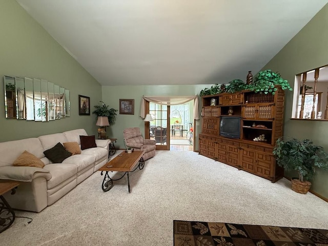 275 Madison St, Port Austin, MI 48467 - living area with lofted ceiling and carpet flooring