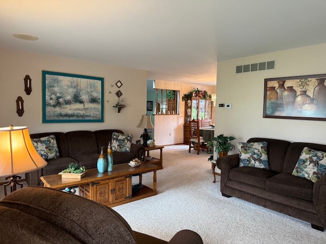 275 Madison St, Port Austin, MI 48467 - carpeted living area featuring visible vents