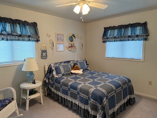 275 Madison St, Port Austin, MI 48467 - bedroom with carpet, baseboards, and ceiling fan