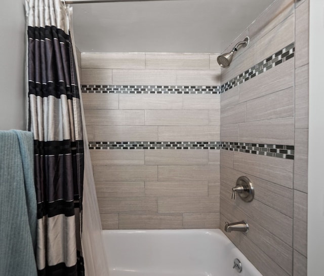 full bathroom featuring shower / tub combo with curtain