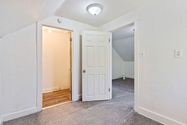 5011 Baldwin Blvd, Flint, MI 48505 - bonus room featuring lofted ceiling, baseboards, and carpet floors