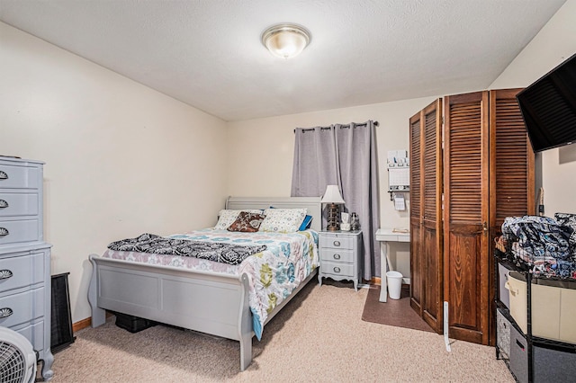 bedroom featuring light colored carpet