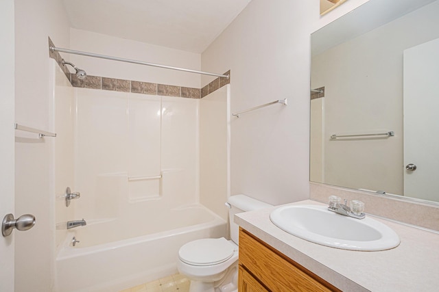 bathroom featuring vanity, toilet, and washtub / shower combination