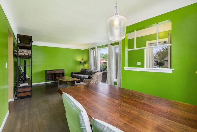 8458 Francine St, Warren, MI 48093 - dining area featuring dark wood-style floors and baseboards