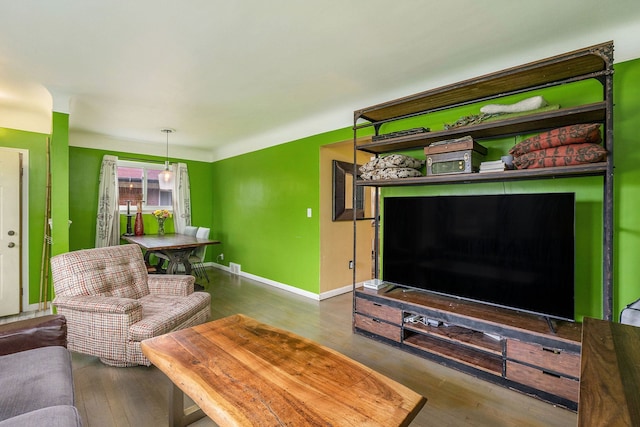 8458 Francine St, Warren, MI 48093 - living area featuring wood finished floors and baseboards