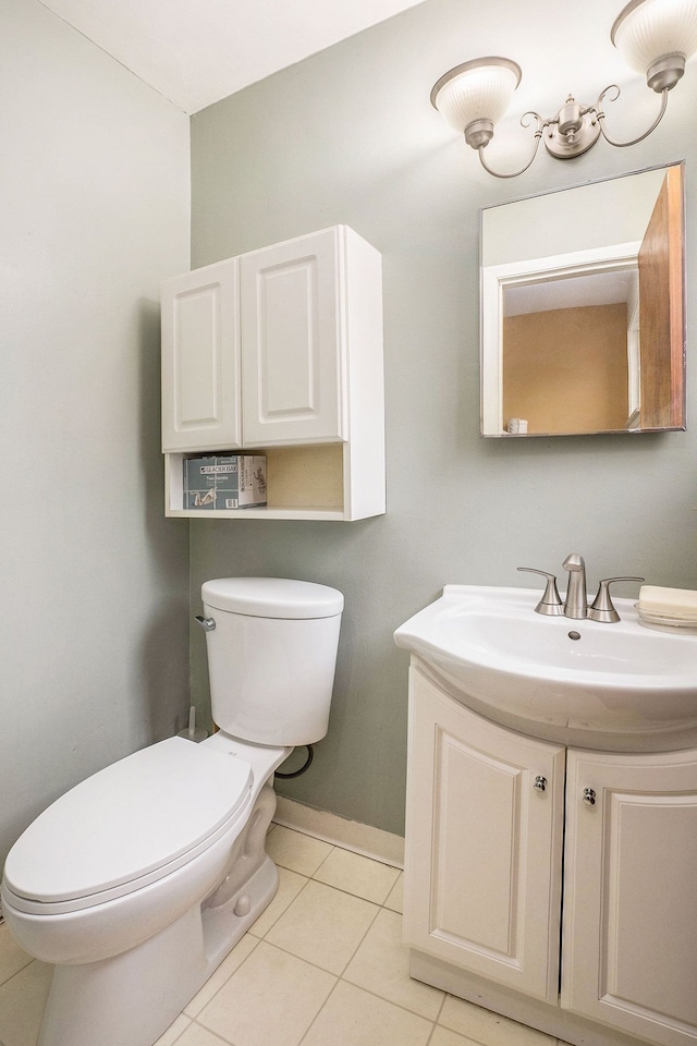 8458 Francine St, Warren, MI 48093 - half bath featuring tile patterned floors, toilet, vanity, and baseboards