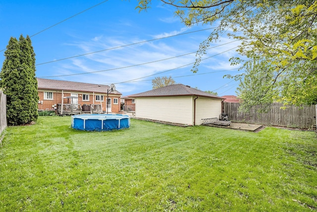 8458 Francine St, Warren, MI 48093 - view of yard featuring a wooden deck