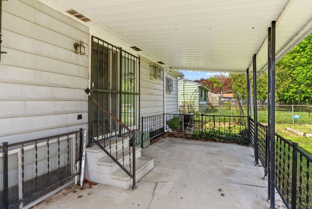 view of patio with fence
