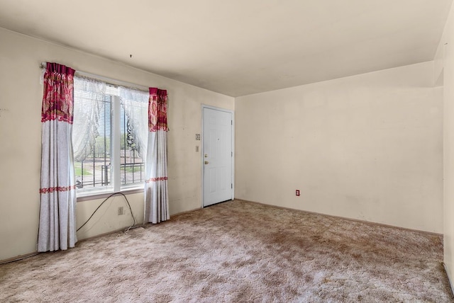 view of carpeted spare room