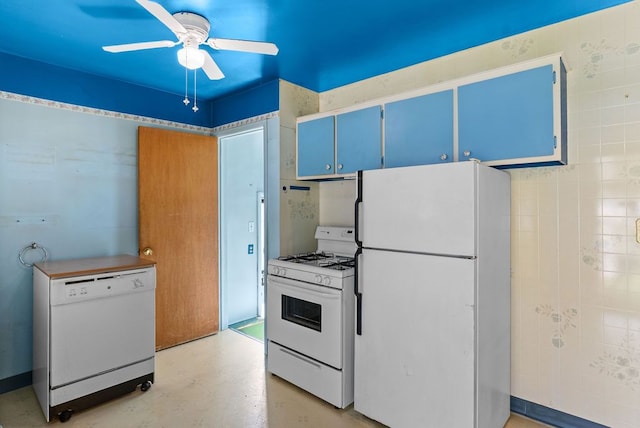 kitchen featuring white appliances, blue cabinetry, ceiling fan, and concrete floors
