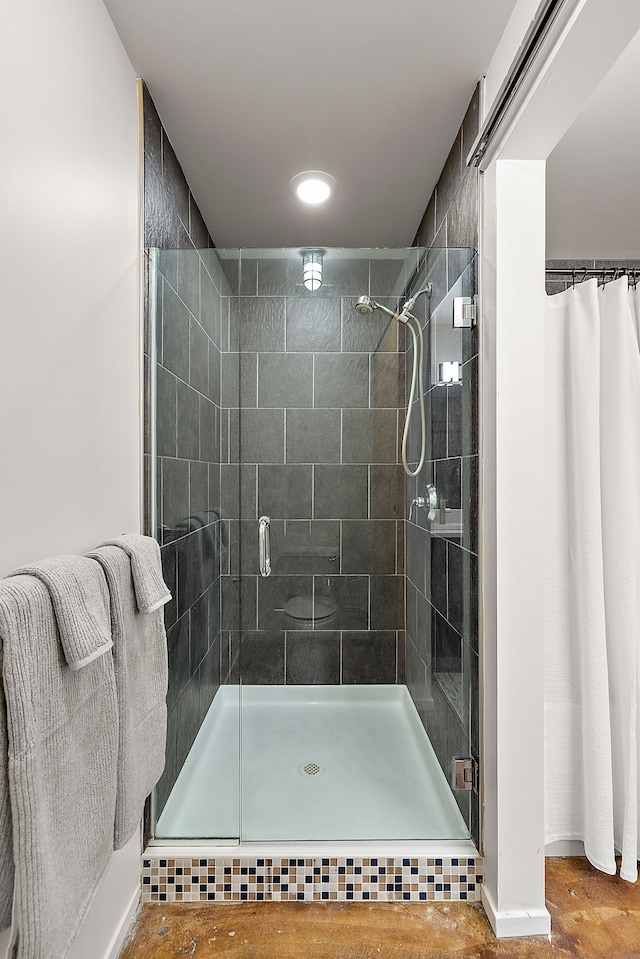 full bathroom with a shower stall