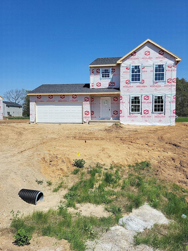 7964 Sierra Dr, Belding, MI 48809 - view of front of home with a garage